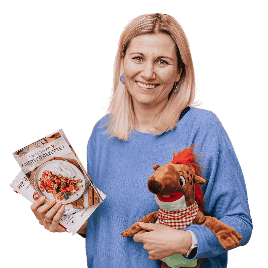 Jenny mit Buch und Kört als Kuscheltier